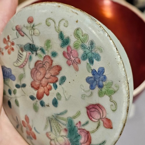 784 - A Chinese 19th century famille rose porcelain jar and cover, with painted enamel insects and flowers... 