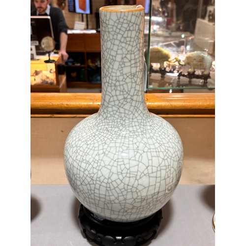 785 - A Chinese crackle glaze porcelain onion-shaped vase on carved wood stand, overall height 39cm