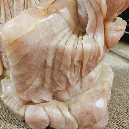 851 - A massive Chinese rose quartz figure of Guanyin holding a Rui sceptre, height 71cm