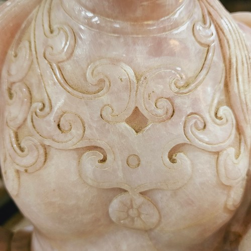 851 - A massive Chinese rose quartz figure of Guanyin holding a Rui sceptre, height 71cm