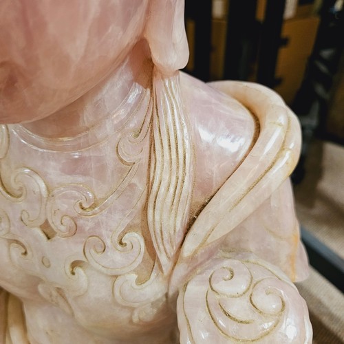 851 - A massive Chinese rose quartz figure of Guanyin holding a Rui sceptre, height 71cm