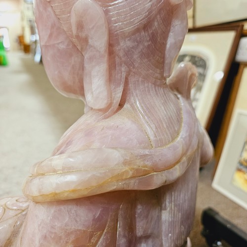 851 - A massive Chinese rose quartz figure of Guanyin holding a Rui sceptre, height 71cm