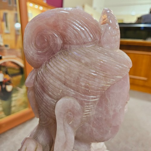 851 - A massive Chinese rose quartz figure of Guanyin holding a Rui sceptre, height 71cm