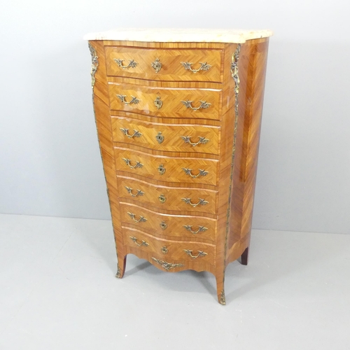 2005 - A French Kingwood and satinwood inlaid marble top semainier chest of seven drawers, with brass ormol... 