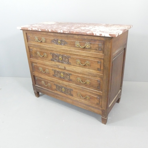 2007 - A French 18th century oak chest of four long drawers, with rouge marble top, brass pulls and carved ... 