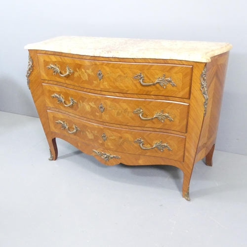 2011 - A French Louis XV style walnut veneered and satinwood strung bombe commode chest of three drawers, w... 