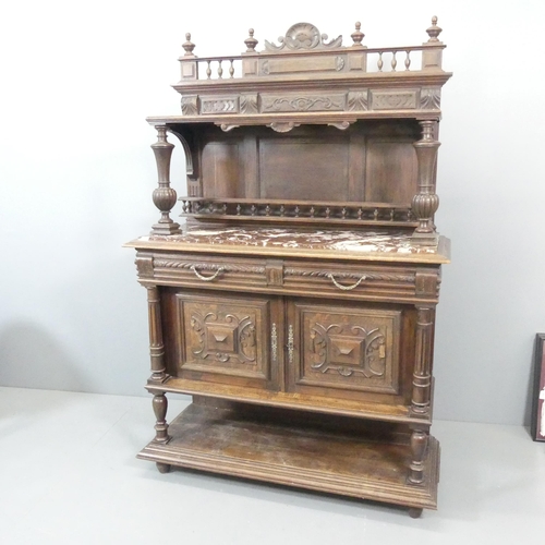 2012 - An Antique French Henri II style oak marble-topped buffet / sideboard, with two drawers above two pa... 