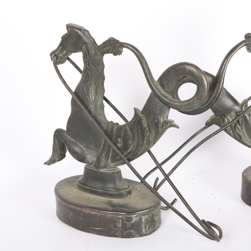 109 - A pair of Venetian patinated brass hippocamp gondola adornments, on lead weighted bases, H23.5cm