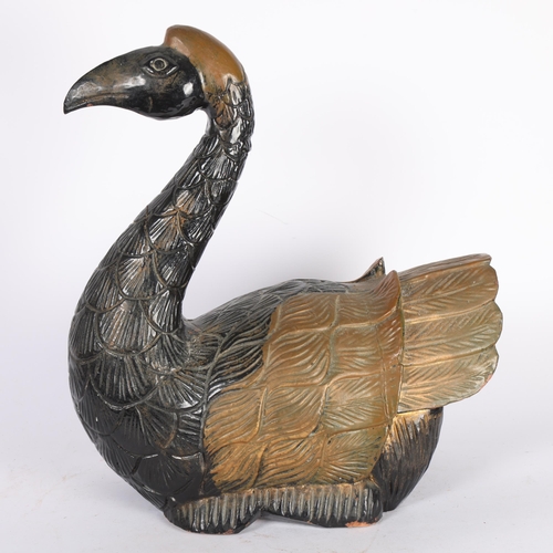 112 - A Folk Art carved and painted wood study of a duck, H37.5cm