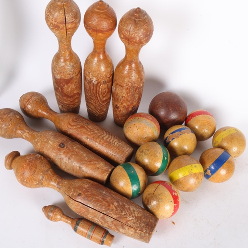 120 - A collection of Vintage wood skittles and balls