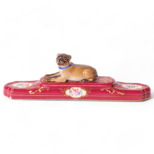 14 - Meissen, a 19th century porcelain Pug dog paperweight on stepped base, with a gold and blue collar, ... 