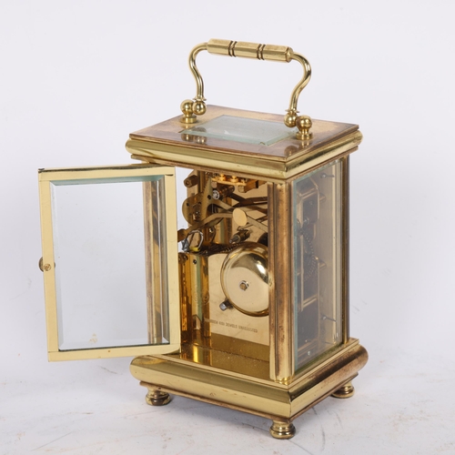 150 - David Peterson, England, a brass-cased carriage clock, bell striking, height 12cm not including hand... 
