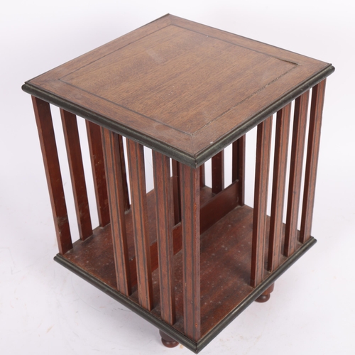 168 - A small mahogany table-top revolving bookcase, H31cm