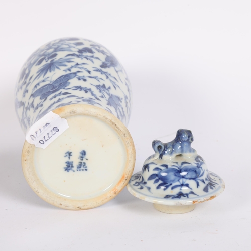 230 - A 19th century blue and white baluster vase, with associated lid and 4 character marks to the unders... 