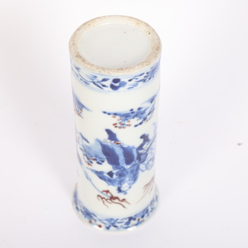 238 - A Chinese blue and white and iron red sleeve vase, painted with figures holding swords and flaming t... 