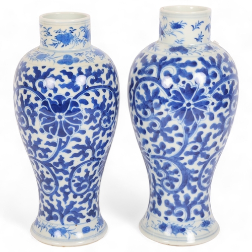 245 - 2 similar Chinese blue and white baluster vases, floral decoration, both stamped to the underside wi... 