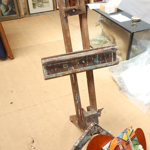 294 - A Vintage pine floor standing adjustable folding artist's easel, height stowed 157cm, and a selectio... 