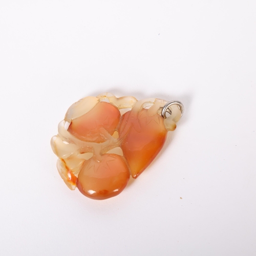 36 - A Chinese carved carnelian agate fruit pendant, L5.5cm