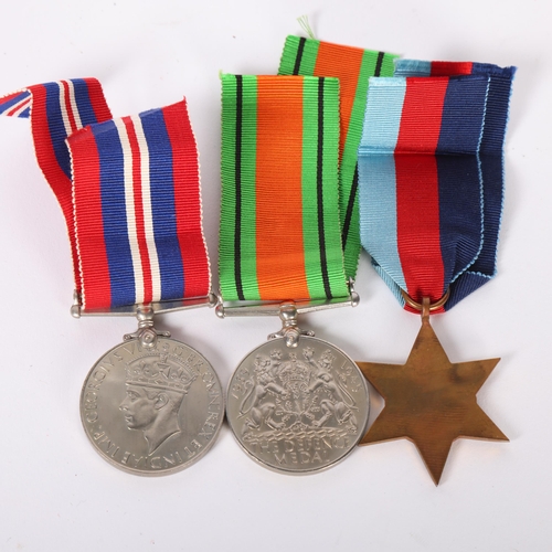 40 - A group of Second World War medals and ribbons, with original box