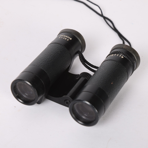 49 - A pair of Leitz Trinovid 8x20C binoculars, serial no. 973726