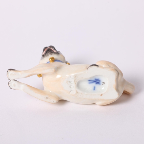 5 - Meissen, a porcelain figure of a seated Pug, with blue and gilded studded collar, L7.7cm, with blue ... 