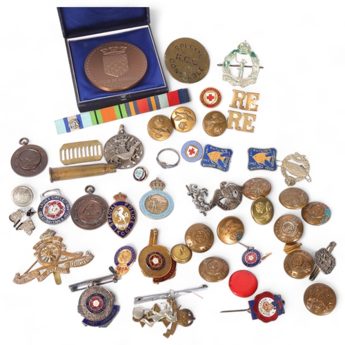 53 - A collection of various military buttons and badges, KCC Special Constable, and a silver RAF sweethe... 
