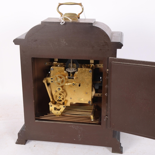 557 - A mahogany-cased 3-train bracket clock, with key, H38cm overall