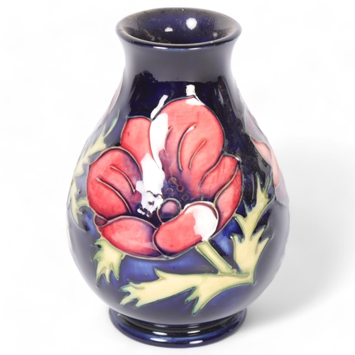 56 - Moorcroft, an Anemone pattern baluster vase, H14cm