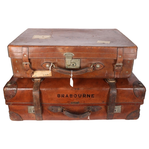 576 - A Brabourne leather trunk, 82cm across, and a smaller leather suitcase with straps