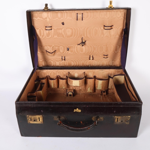 592 - A 20th century leather vanity case, with fitted interior, monogram V.E.D., W51cm