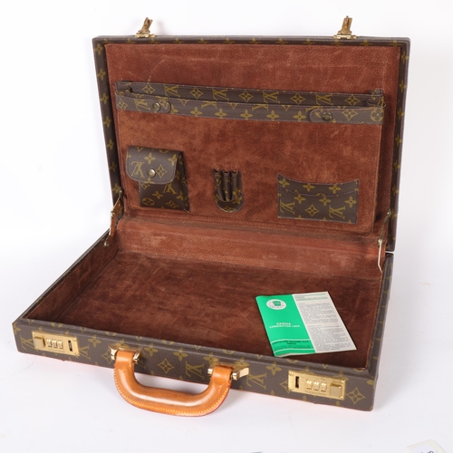 593 - A reproduction leather-bound brief case, W45cm