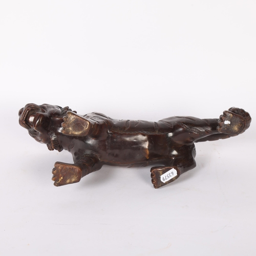 596 - Cast-bronze study of a tiger, L35cm