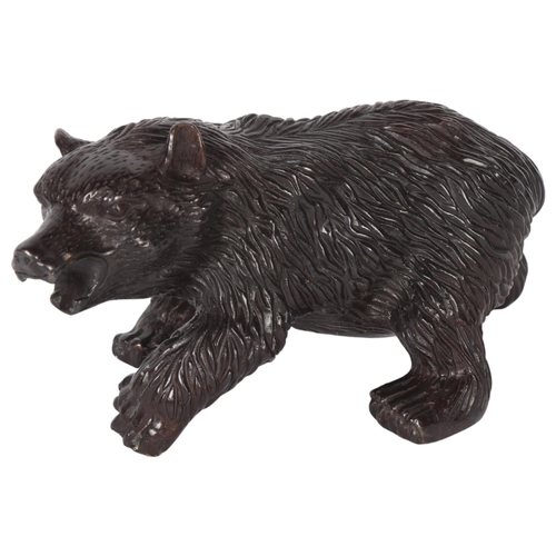 597 - A cast-bronze study of a bear, L21cm