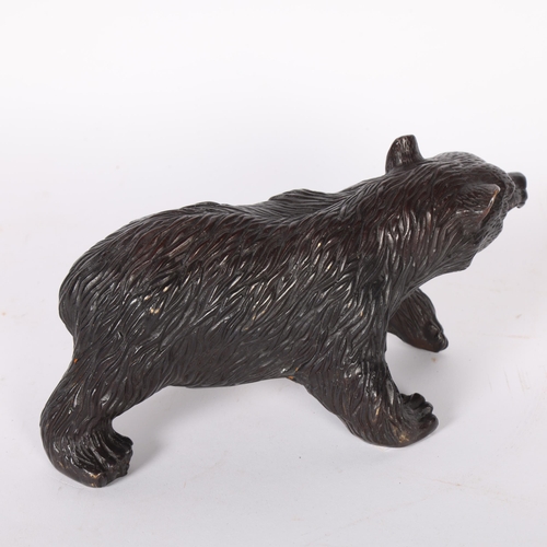 597 - A cast-bronze study of a bear, L21cm