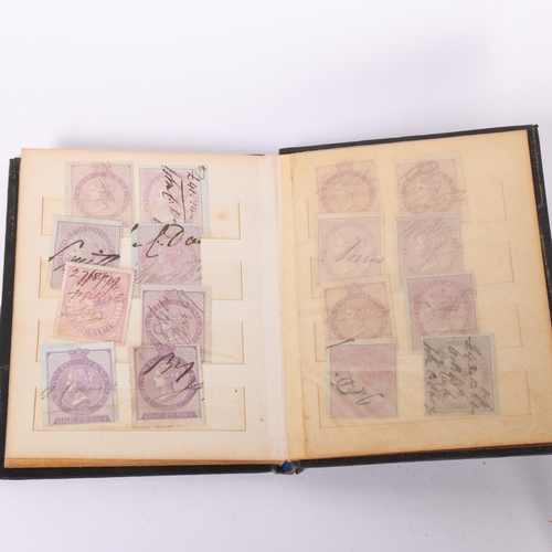 82 - A small Victorian stamp album (38 stamps), including One Penny Inland Revenue, Six Pence Inland Reve... 