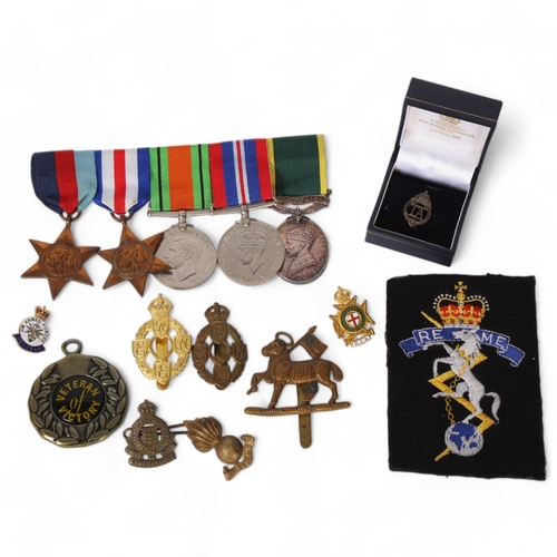 84 - A group of 4 Second World War medals, including the France and Germany Star, and a George V Efficien... 