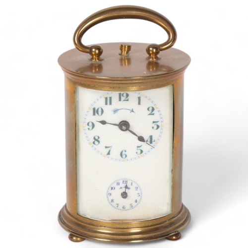 91 - An Antique cylindrical brass-cased carriage clock, with secondary dial, complete with key, height no... 
