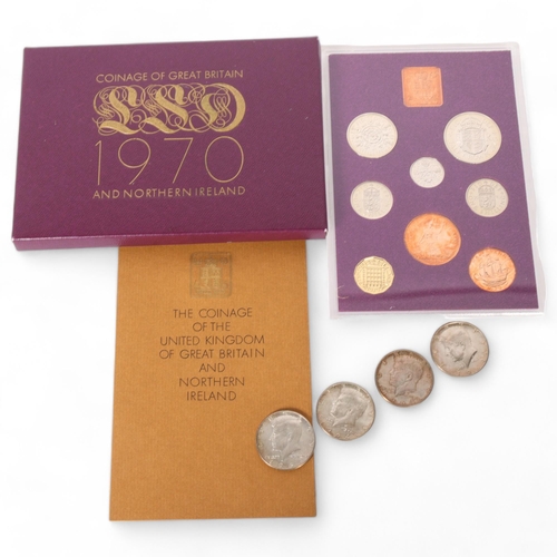 93 - A 1970 commemorative presentation pack of coins, together with 4 American 1964 half dollars
