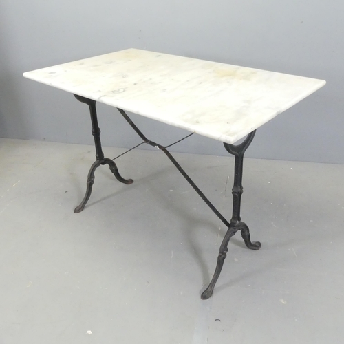 2674 - A rectangular marble-topped garden table on cast iron frame. 100x75x60cm.