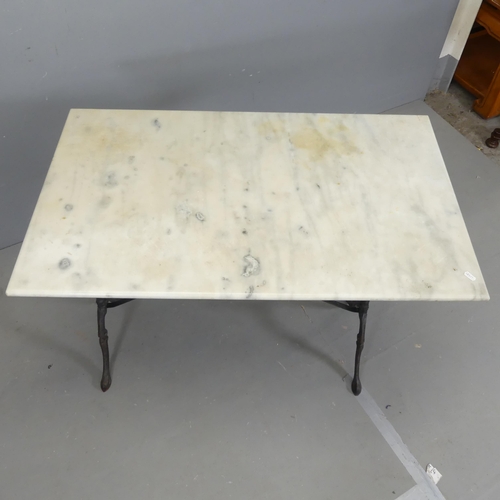 2674 - A rectangular marble-topped garden table on cast iron frame. 100x75x60cm.