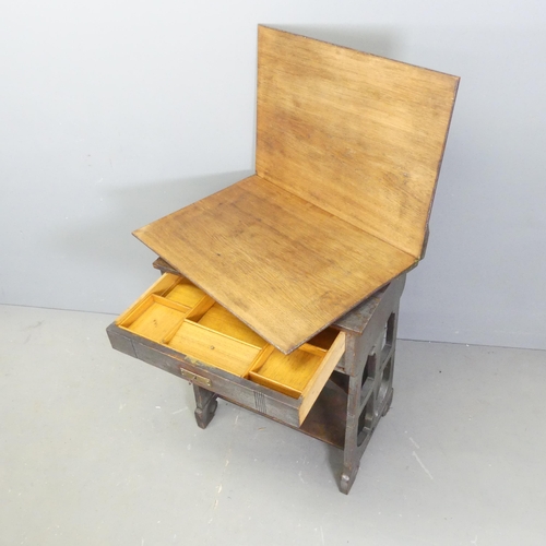 2679 - A German Arts & Crafts or Jugendstil oak sewing table with fold-out top and fitted drawer. 65x79x46c... 