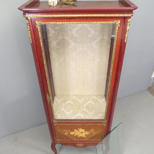 2681 - A modern French display cabinet, with brass mounts, two adjustable shelves and marquetry inald decor... 