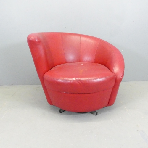 2683 - A mid-century faux-leather upholstered asymetric swivel cocktail chair on metal five-star base, in t... 