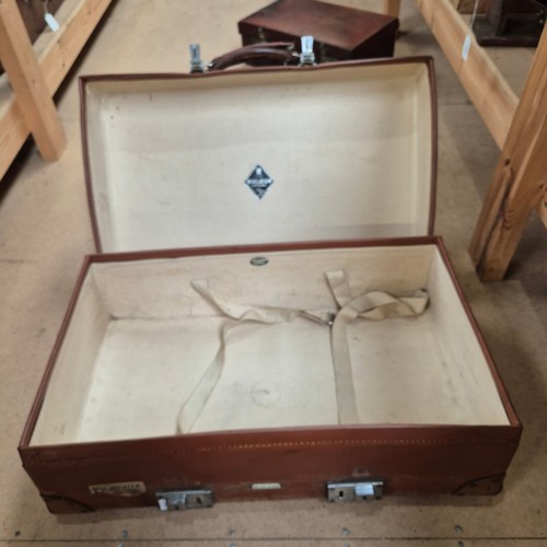 575 - A group of 3 suitcases, including a Vintage leather case, L61cm, a Revelation case, and a small leat... 