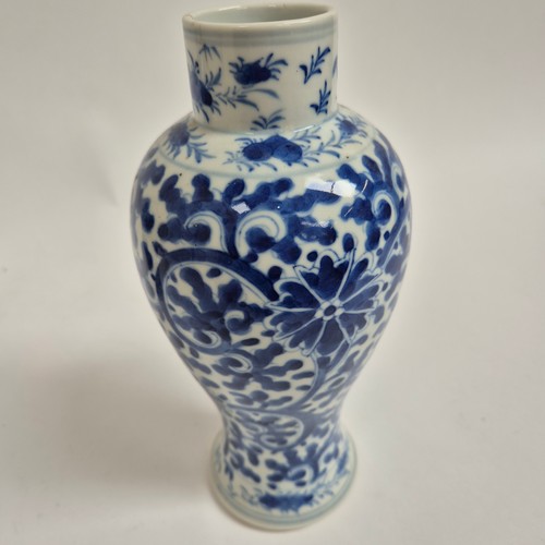 245 - 2 similar Chinese blue and white baluster vases, floral decoration, both stamped to the underside wi... 