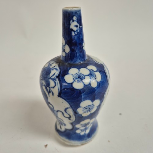 246 - A Chinese blue and white baluster vase, depicting 2 dragons facing with floral surroundings, 4 chara... 