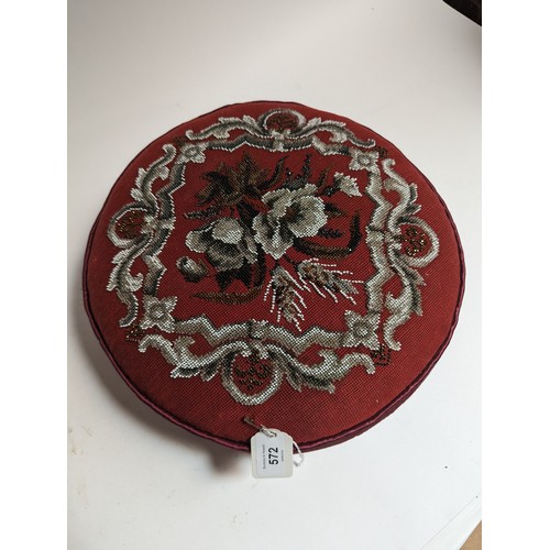 572 - A pair of Victorian horse hair upholstered button stool cushions, with beadwork decorated floral top... 