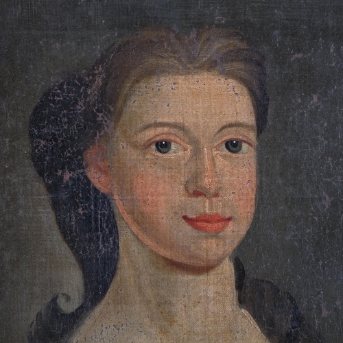 114 - 18th century portrait of a woman, oil on canvas laid on panel, unsigned with indistinct inscription ... 