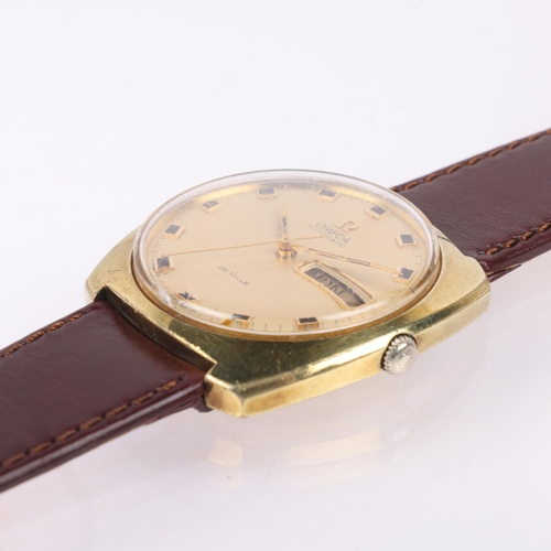 1027 - OMEGA - a Vintage gold plated De Ville automatic calendar wristwatch, circa 1960s, champagne dial wi... 