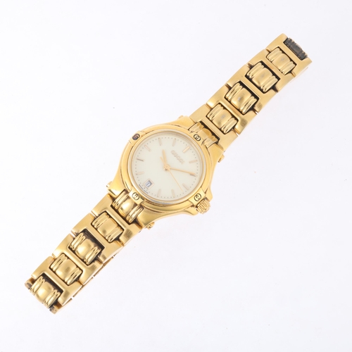 1029 - GUCCI - a lady's gold plated 9240L quartz bracelet watch, cream dial with gilt baton hour markers, p... 